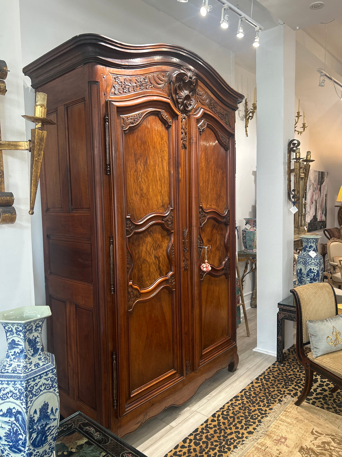 MONUMENTAL FRENCH LYONNAIS CARVED WALNUT ARMOIRE