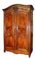 MONUMENTAL FRENCH LYONNAIS CARVED WALNUT ARMOIRE